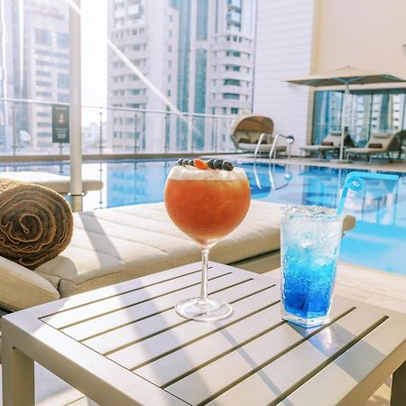 Khalidia Palace Hotel Dubai By Mourouj Gloria ภายนอก รูปภาพ The pool at the hotel