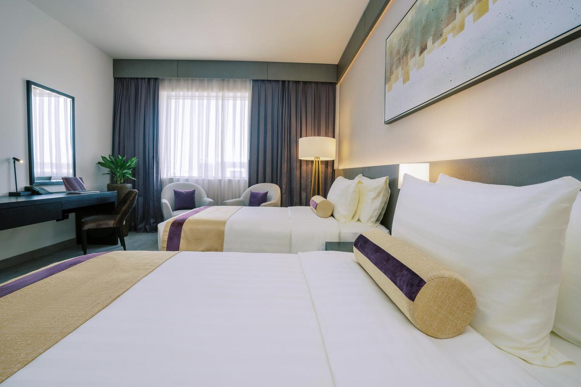 Khalidia Palace Hotel Dubai By Mourouj Gloria ภายนอก รูปภาพ Deluxe Room