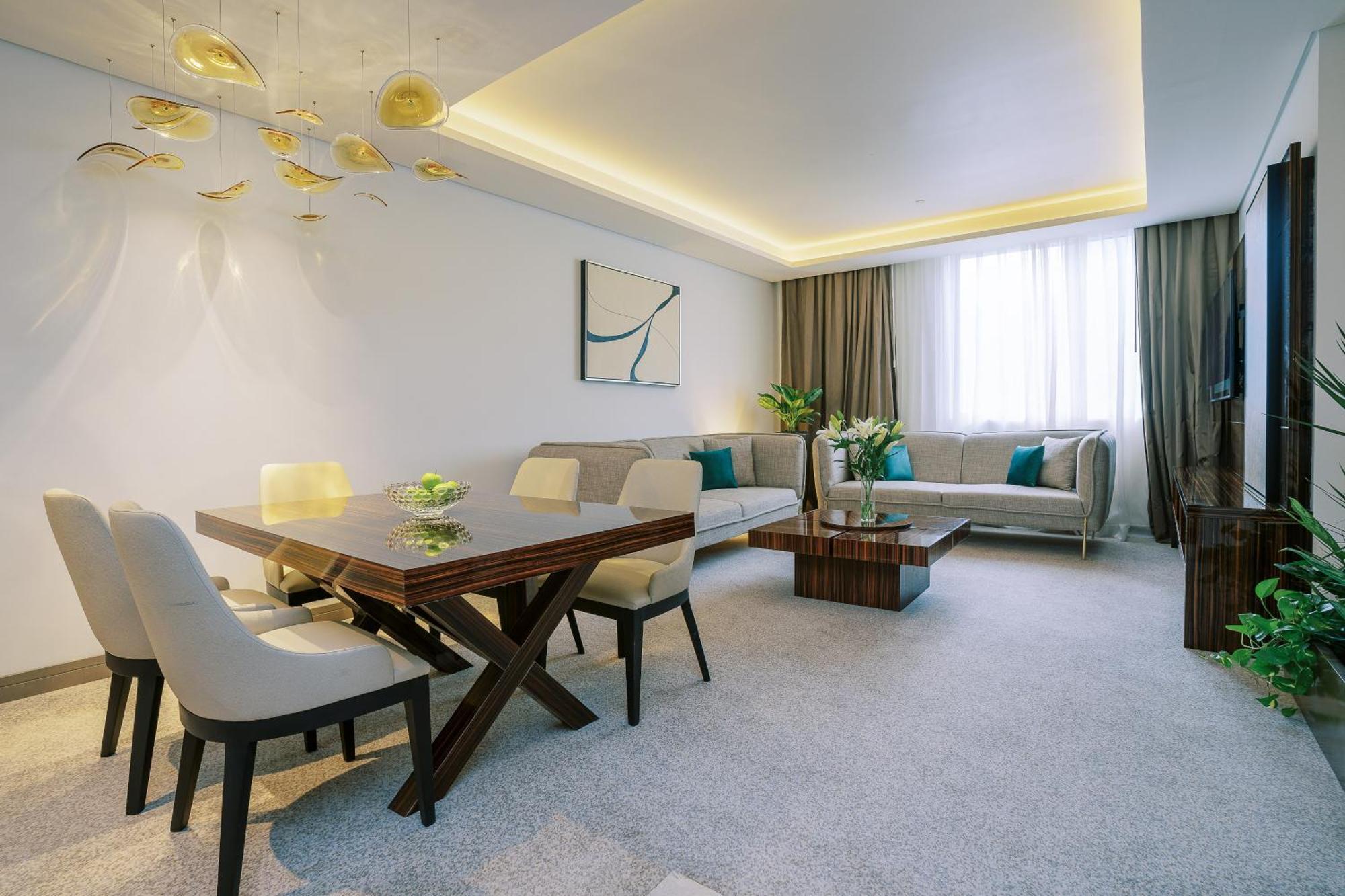 Khalidia Palace Hotel Dubai By Mourouj Gloria ภายนอก รูปภาพ A 3D rendering of a living room