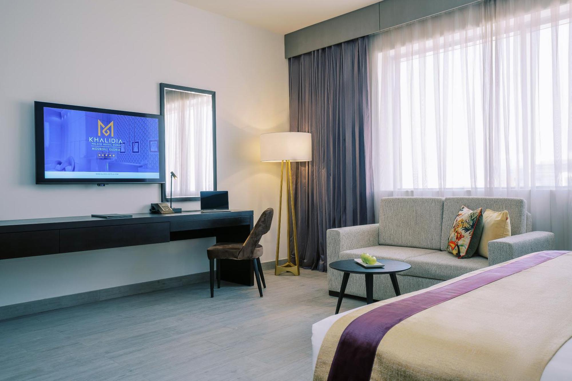 Khalidia Palace Hotel Dubai By Mourouj Gloria ภายนอก รูปภาพ Deluxe Room